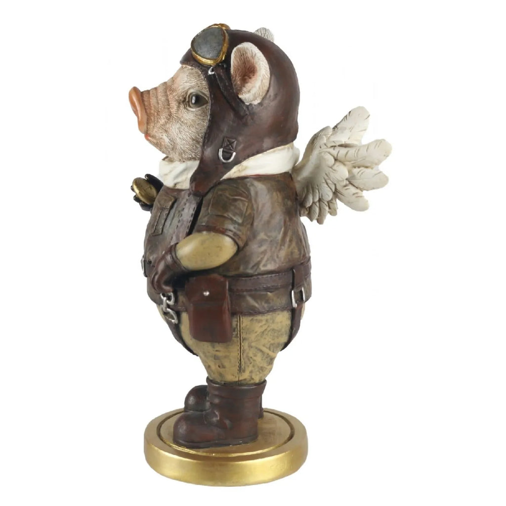 Statue of a pig in a pilot outfit with goggles on a white background-Mystic-Cave