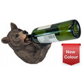 Bear-shaped wine bottle holder with a green wine bottle on a white background
