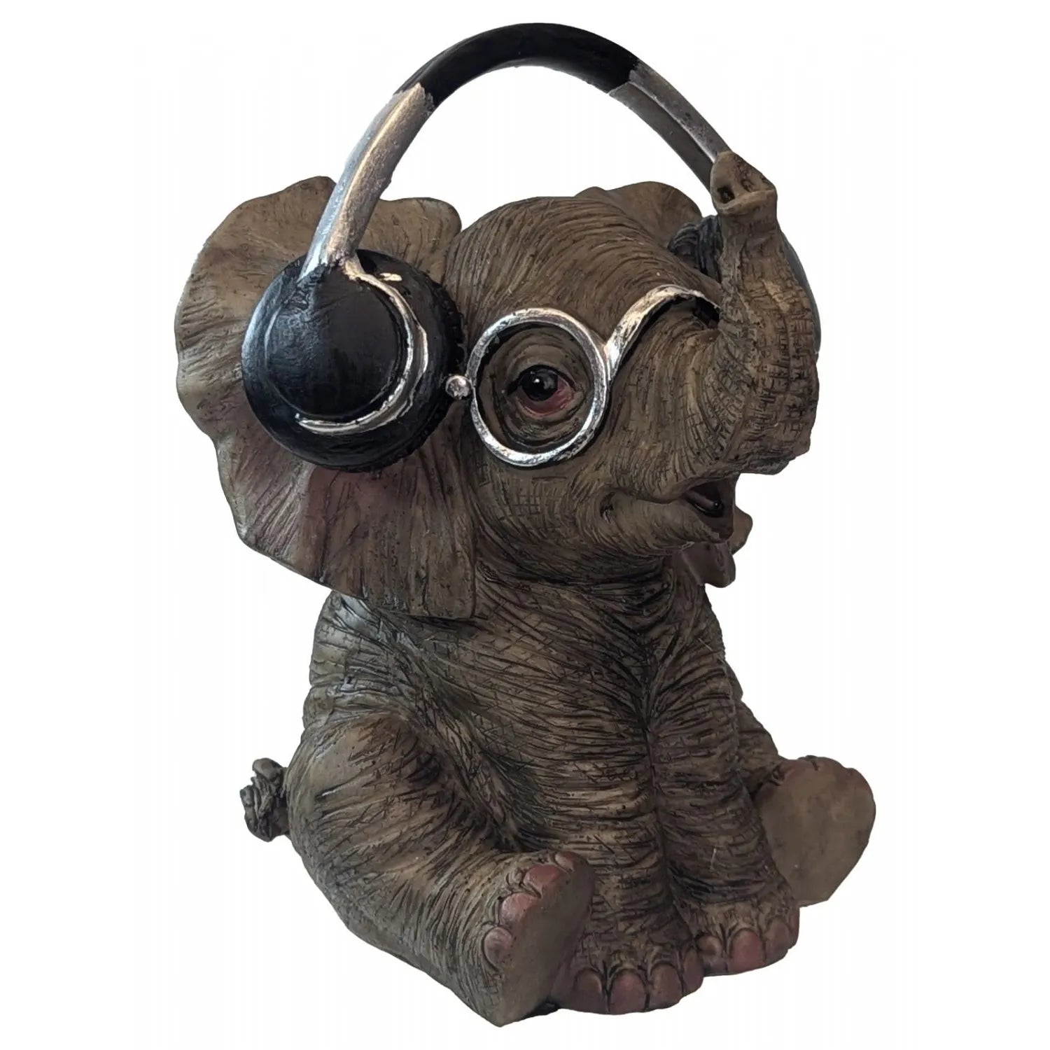 Statue of an elephant wearing headphones on a white background-Mystic-Cave