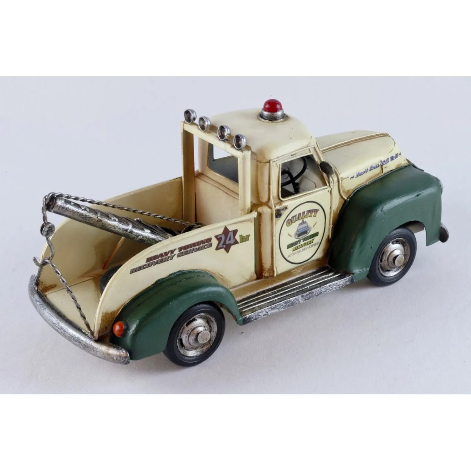 Model tow truck with vintage design on a white background-Mystic-Cave