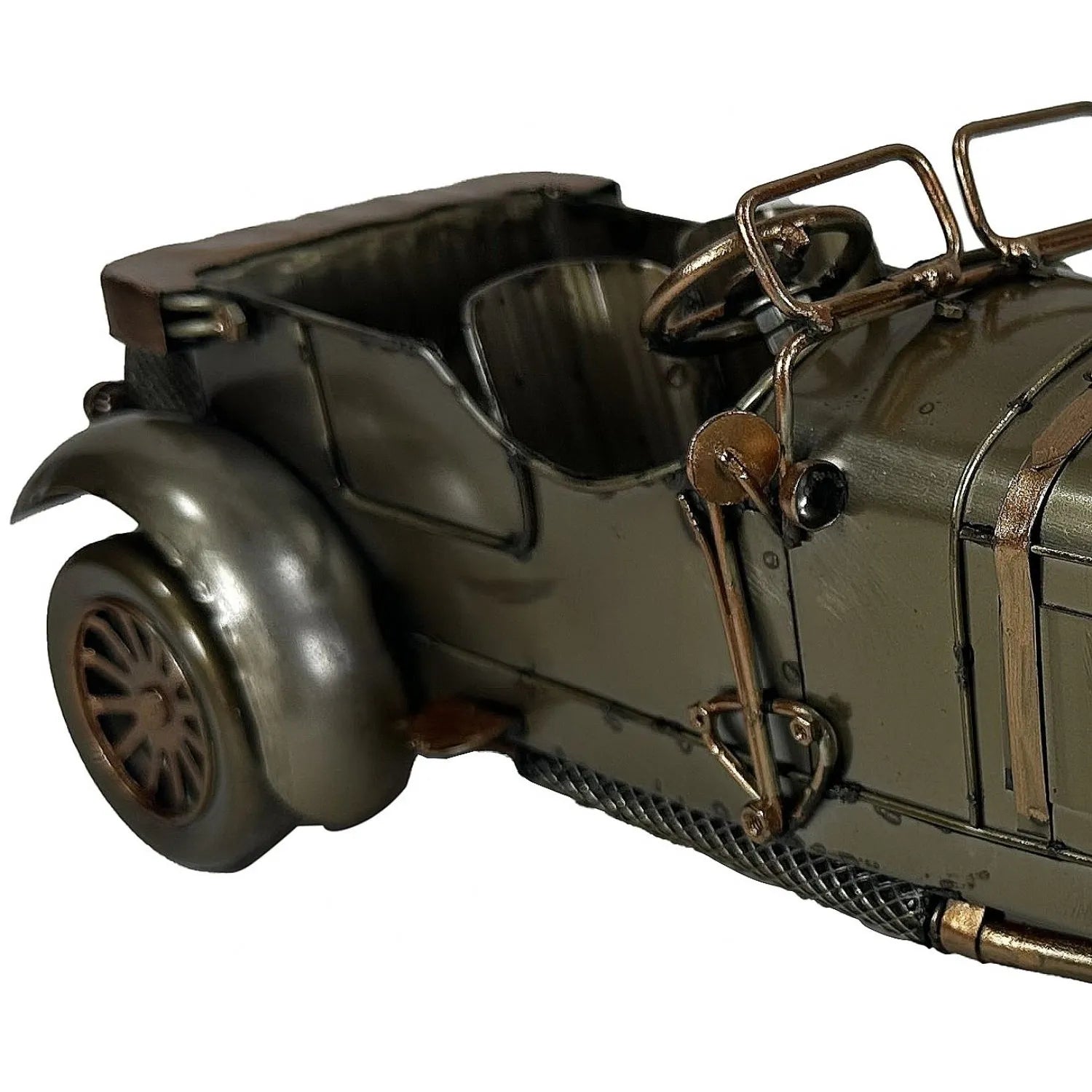 Close-up of a vintage-style model car with metallic finish on a white background-Mystic-Cave