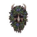 Decorative mask with a face surrounded by leaves and flowers on a white background Mystic-cave