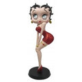 A Betty Boop collectible figurine in a red bikini, posed on a black circular base against a plain white background.