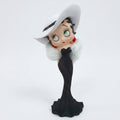 A collectible figurine of classic cartoon character Betty Boop wearing a black glittery gown, white faux fur collar, and a large white hat, set against a plain white background.