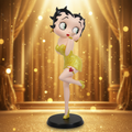Betty Boop classic pose yellow glitter figurine with warm golden glamorous Hollywood background and sparkling bokeh