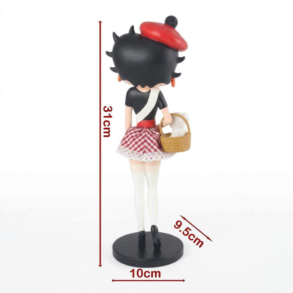 A stylized figurine of a woman with black hair, a red beret, a black-and-white top, and a red-and-white check skirt, holding a woven basket. Red dimension lines and text show measurements of 31 cm height, 10 cm base width, and 9.