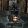 Decorative stone arch with two cats and candles on a stone floor.-Mystic-Cave