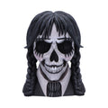 Skull-faced figure with black hair and a white shirt on a white background