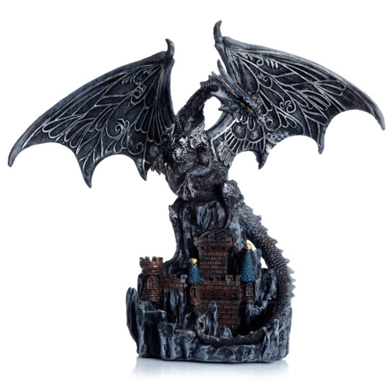 Dragon figurine with a castle on a white background
