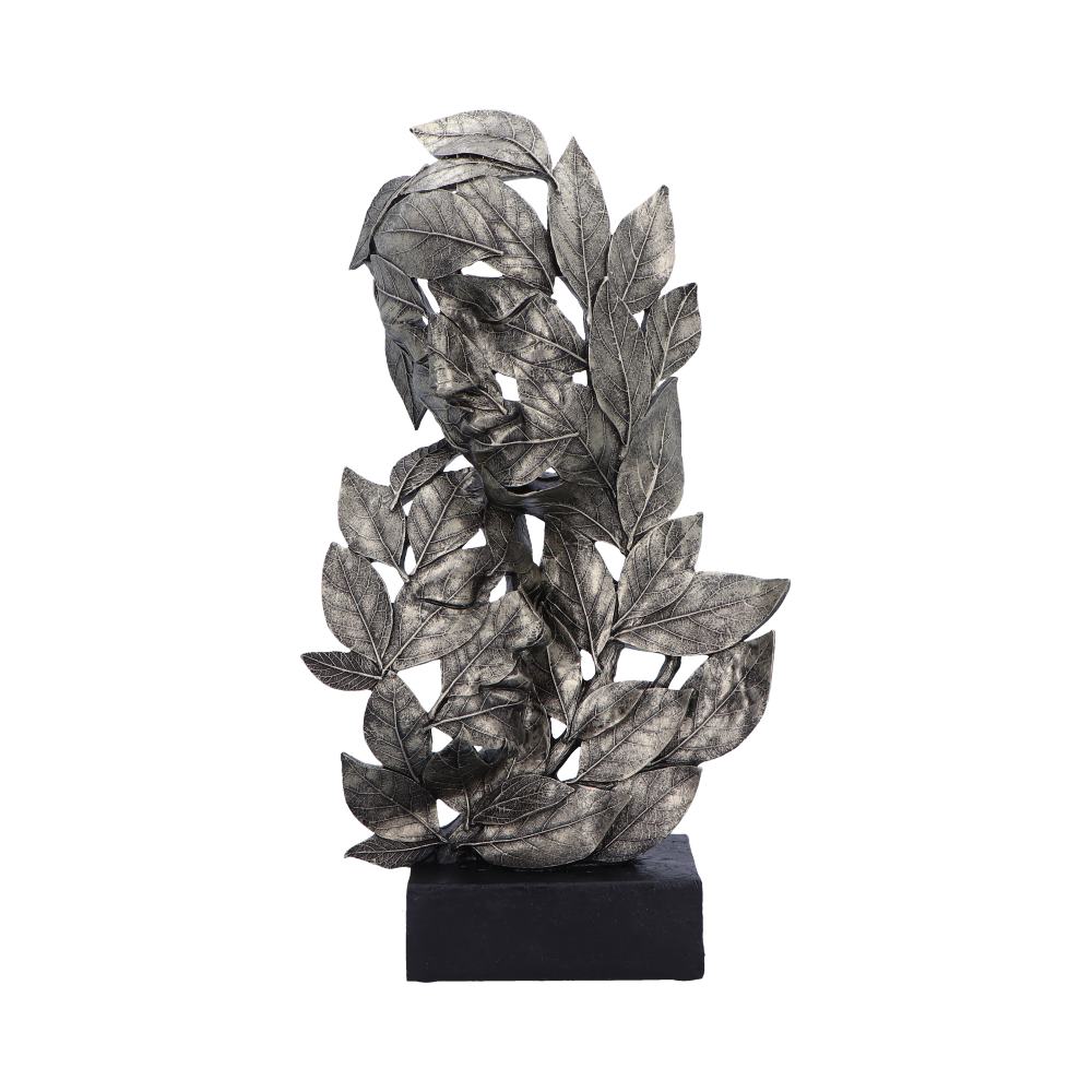 Decorative metal leaf sculpture on a black base against a white background mystic-cave