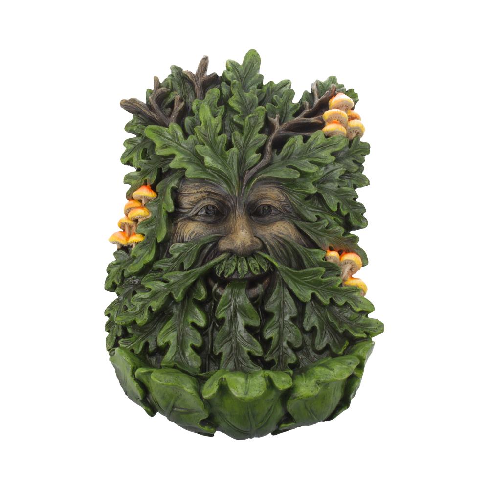 Green leafy creature figurine with a face made of leaves on a white background