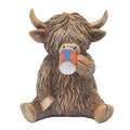 Statue of a highland cow with a cup featuring the Illinois Fighting Illini logo on a white background