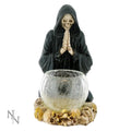 Statue of a skeleton in a black robe with a crystal ball on a white background