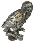 Steampunk-style owl figurine with mechanical components on a white background