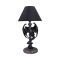 Decorative table lamp with black dragon design and black shade on a white background-Mystic-cave