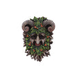 Decorative mask with ram's head and leafy design on a white background mystic-cave 