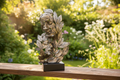 Natural Emotion — Embrace Silver Statue garden lifestyle shot mystic-cave