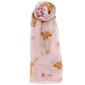 Scarf with highland cow and floral design on a light pink background